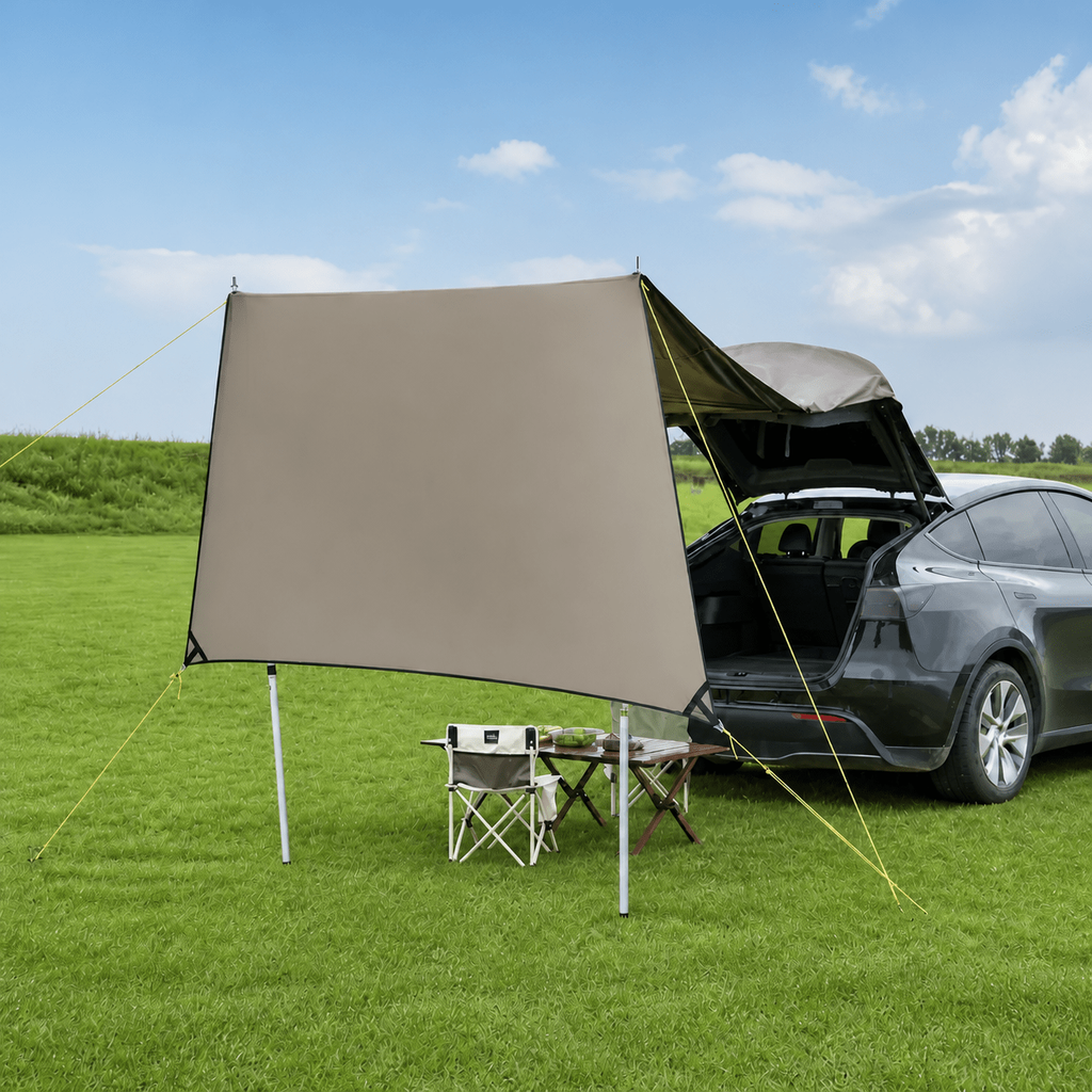 Tesery tailgate canopy attached to the open liftgate of a Tesla Model Y